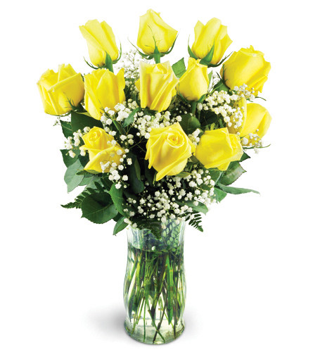 Classic Yellow Roses. An arrangement by Avenue Flowers and Gifts. A dozen beautiful yellow roses are perfectly arranged with baby's breath,...