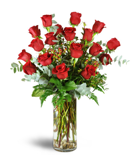 Roses are Romance™ - Deluxe. An arrangement by Avenue Flowers and Gifts. Long-stemmed roses are elegantly arranged with eucalyptus and hypericum...