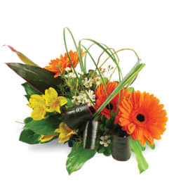 Triple Delight. An arrangement by Avenue Flowers and Gifts.