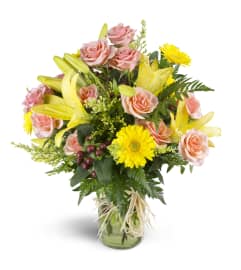 Sweet and Sunny™. An arrangement by Avenue Flowers and Gifts. Sweet and Sunny™. An arrangement by Avenue Flowers and Gifts.