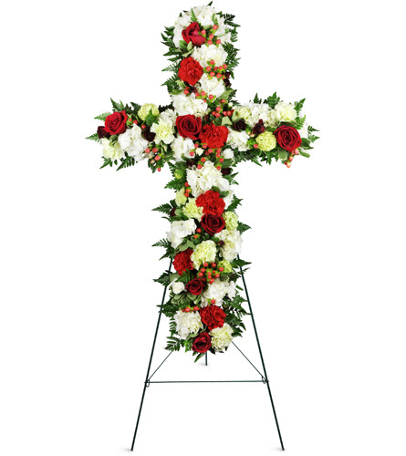 Love and Prayers Sympathy Cross™. An arrangement by Avenue Flowers and Gifts. This classic standing spray cross features red and white carnations...