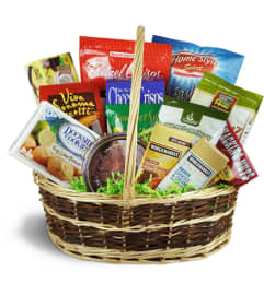 Deluxe Sweet and Savory Snacks Basket™. An arrangement by Avenue Flowers and Gifts.