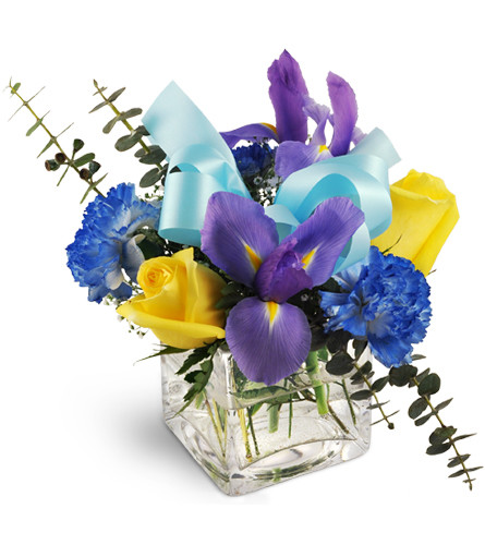 Boy, Oh Boy!. An arrangement by Avenue Flowers and Gifts. Dramatic irises, yellow roses, and blue carnations combine to make magic in a clear...