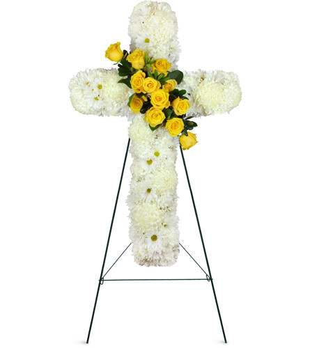 His Promise Cross Spray™. An arrangement by Avenue Flowers and Gifts. A beautiful white cross made of daisies and carnation blooms with golden...