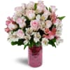 Blushing Love Bouquet™ - Premium. An arrangement by Avenue Flowers and Gifts. Gorgeous pink roses and Peruvian lilies are delicately arranged into...