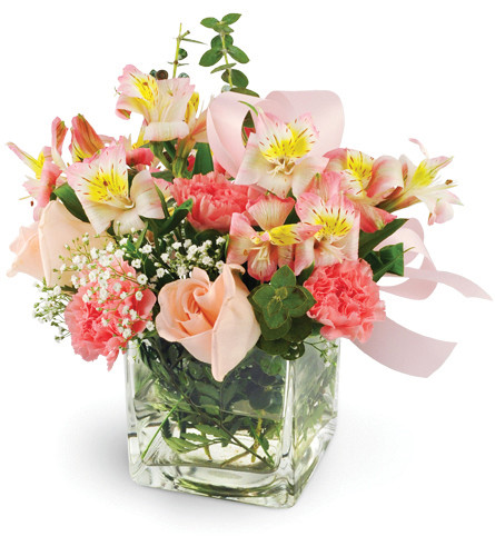 She's So Darling. An arrangement by Avenue Flowers and Gifts. Pink roses, pink carnations, pink alstroemeria, eucalyptus, and baby's breath are...