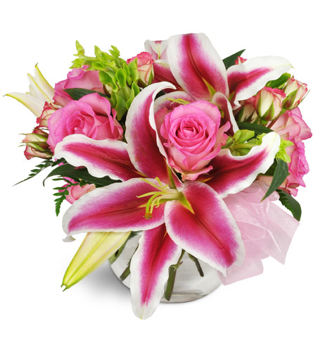 You Are Beautiful Bouquet™. An arrangement by Avenue Flowers and Gifts. Pink Stargazer lilies and pink roses are dramatically arranged with fresh...