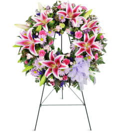 Stargazer Sentiments Wreath™. An arrangement by Avenue Flowers and Gifts.