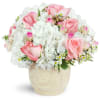 Graceful Embrace - Premium. An arrangement by Avenue Flowers and Gifts. Bursting with white hydrangea, light pink roses, and spray roses, this...