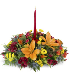 Warm and Wonderful Centerpiece™. An arrangement by Avenue Flowers and Gifts.