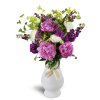 Wild at Heart™ - Standard. An arrangement by Avenue Flowers and Gifts. Peonies, ranunculus, and more are arranged in a glass vase..