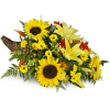 Giving Thanks Cornucopia™ - Standard. An arrangement by Avenue Flowers and Gifts. Lilies, sunflowers, mini Gerbera daisies, and more overflow from...