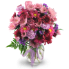 Purple Moon - Standard. An arrangement by Avenue Flowers and Gifts. Roses, carnations, chrysanthemums, and statice in shades of pleasing purples...