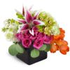 Vibrant Delight™ - Premium. An arrangement by Avenue Flowers and Gifts. Roses, tulips, hydrangea, and more are arranged in a ceramic vase. Upgrade...