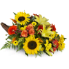 Giving Thanks Cornucopia™ - Deluxe. An arrangement by Avenue Flowers and Gifts. Lilies, sunflowers, mini Gerbera daisies, and more overflow from a...