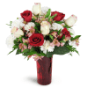 Romance of Roses™ - Deluxe. An arrangement by Avenue Flowers and Gifts. Give a stunning gift of red and cream roses arranged with carnations,...