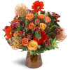 Energetic Orange™ - Premium. An arrangement by Avenue Flowers and Gifts. Unique pincushion protea are arranged with orange spray roses, mini...