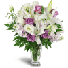 Sweet as Sugar Bouquet™ - Standard. An arrangement by Avenue Flowers and Gifts. White and lavender roses are arranged with Asiatic lilies, stock,...