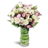 Sweetest Valentine™ - Deluxe. An arrangement by Avenue Flowers and Gifts. Roses and spray roses are arranged with tulips, lisianthus, and more in...