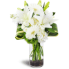 Inspired Blooms™ - Deluxe. An arrangement by Avenue Flowers and Gifts. White lilies, white hydrangea, and white spray roses are accented with...