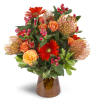 Energetic Orange™ - Deluxe. An arrangement by Avenue Flowers and Gifts. Unique pincushion protea are arranged with orange spray roses, mini...