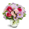 Sweet Surprise™ - Deluxe. An arrangement by Avenue Flowers and Gifts. Hot pink roses stand out among light pink and lavender daisies, spray roses,...