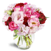 Joyful Heart™ - Premium. An arrangement by Avenue Flowers and Gifts. Bring joy to all with pink roses, lisianthus, stock, and red carnations..