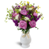 Wild at Heart™ - Premium. An arrangement by Avenue Flowers and Gifts. Peonies, ranunculus, and more are arranged in a glass vase..